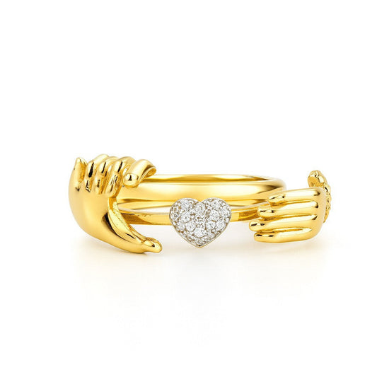 💞 Anello a forma di cuore con mani aperte